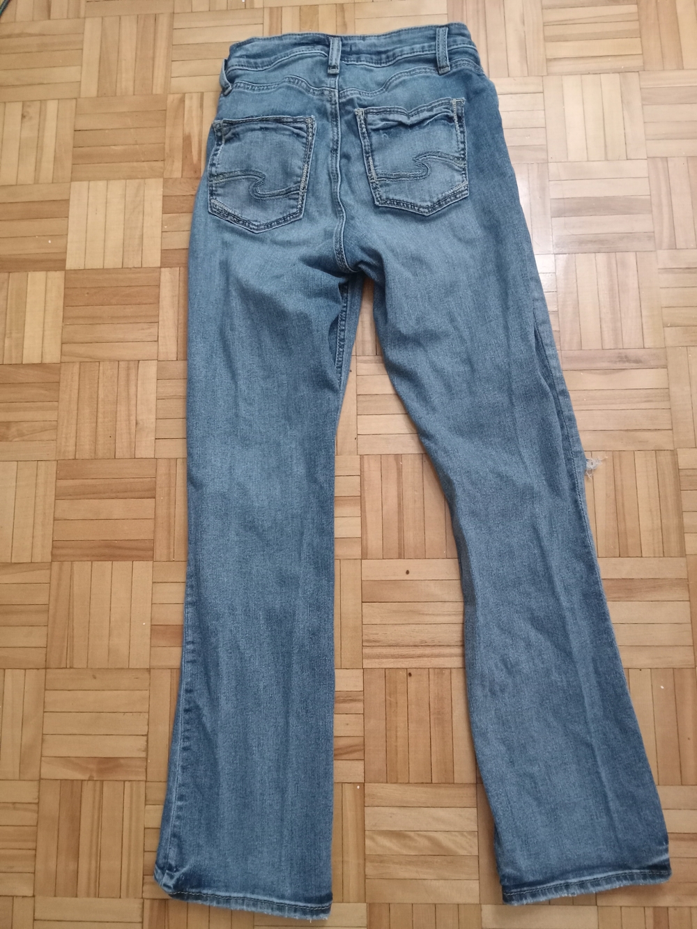 Silver Jeans Women's Faded Blue Flare Jeans